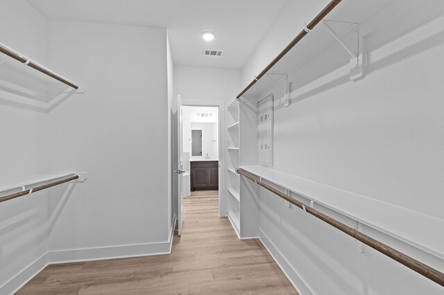 8327 Oceanmist Cove Dr, Cypress, TX 77433 - spacious closet featuring light wood-style flooring