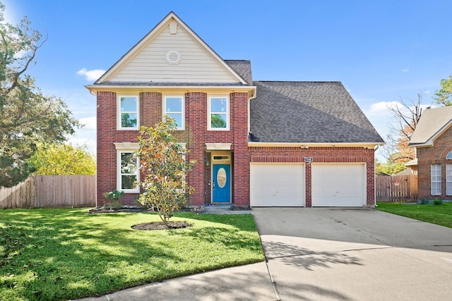 front of property with a garage and a front yard