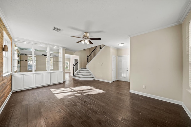 unfurnished living room with crown molding, dark hardwood / wood-style flooring, and ceiling fan