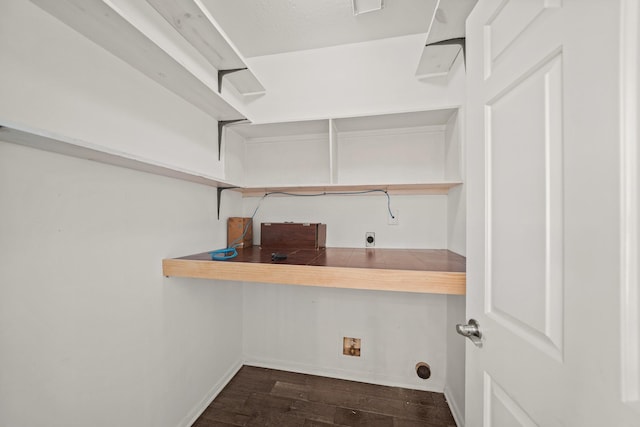 laundry area with hookup for an electric dryer, dark hardwood / wood-style flooring, and washer hookup