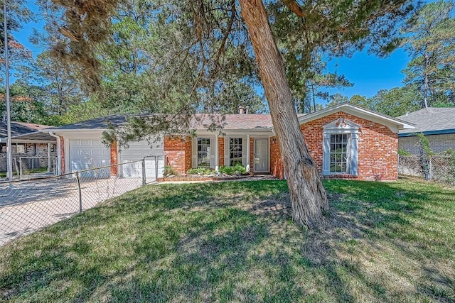 ranch-style house with a front yard and a garage