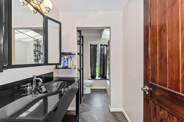 full bathroom with shower / bathing tub combination, tile patterned flooring, vanity, and toilet