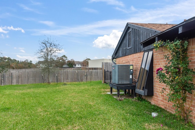 view of yard with central AC