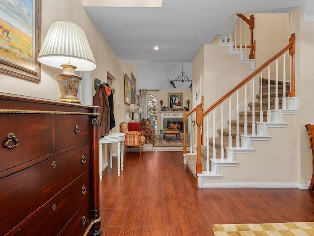 entrance foyer featuring wood-type flooring