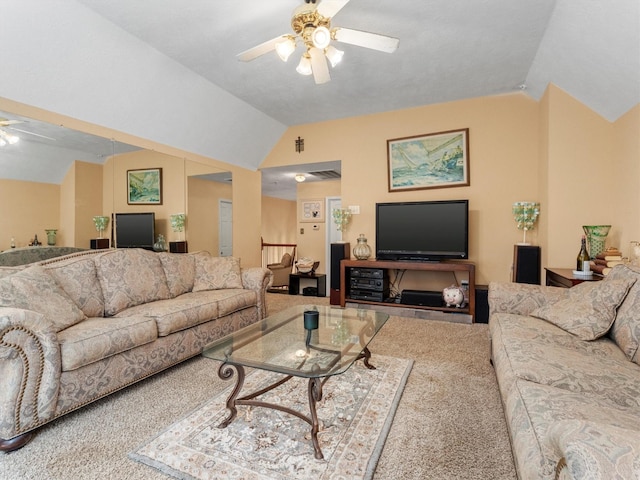 living room featuring carpet flooring, ceiling fan, and vaulted ceiling