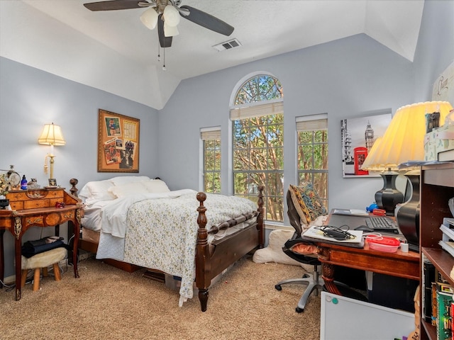 carpeted bedroom featuring ceiling fan and lofted ceiling