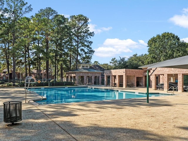 view of pool featuring a patio