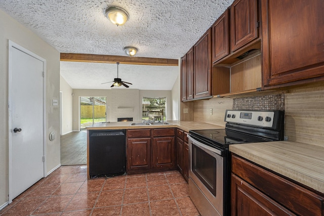 kitchen featuring dishwasher, sink, vaulted ceiling, electric range, and kitchen peninsula