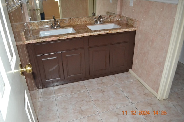 bathroom with vanity and tile patterned floors