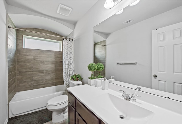 full bathroom featuring vanity, toilet, and shower / tub combo