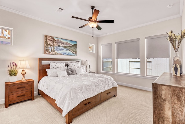 bedroom featuring ceiling fan, crown molding, and light carpet