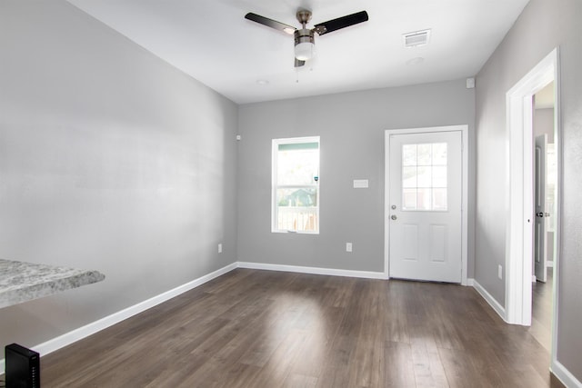 entryway with ceiling fan and dark hardwood / wood-style flooring