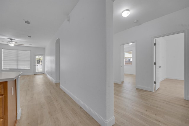 corridor featuring light wood-type flooring