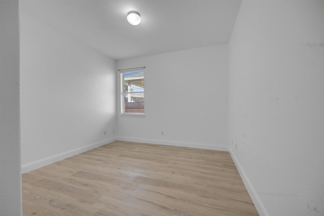 unfurnished room featuring light hardwood / wood-style floors