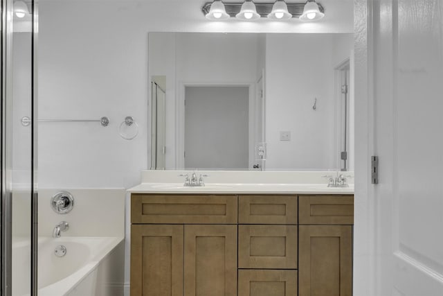 bathroom with plus walk in shower and vanity