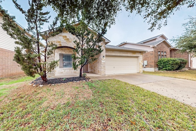 ranch-style house with a garage and a front lawn