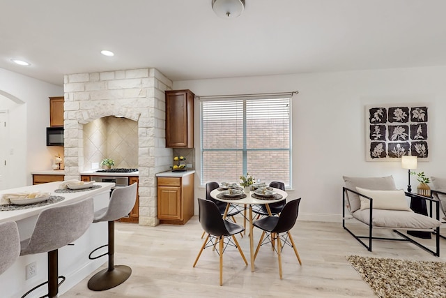 dining area featuring light hardwood / wood-style floors