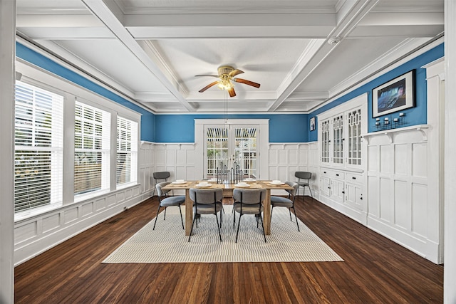 dining space with plenty of natural light, beamed ceiling, and coffered ceiling