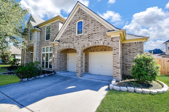 front facade with a garage