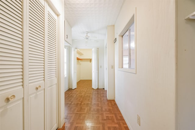 hallway with light parquet floors