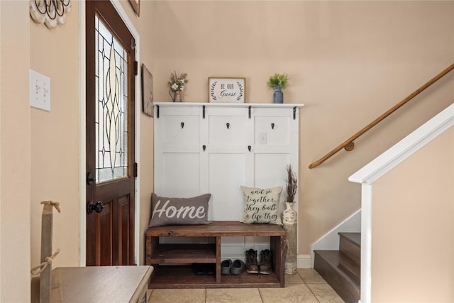 mudroom featuring light tile patterned floors