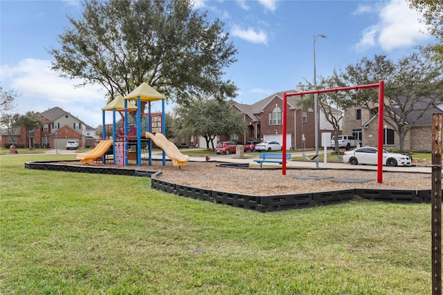 view of playground with a yard