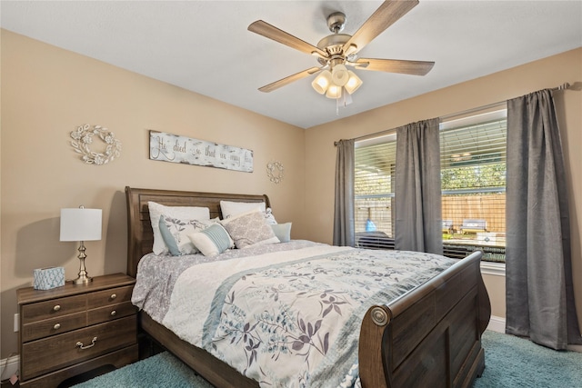 carpeted bedroom with ceiling fan