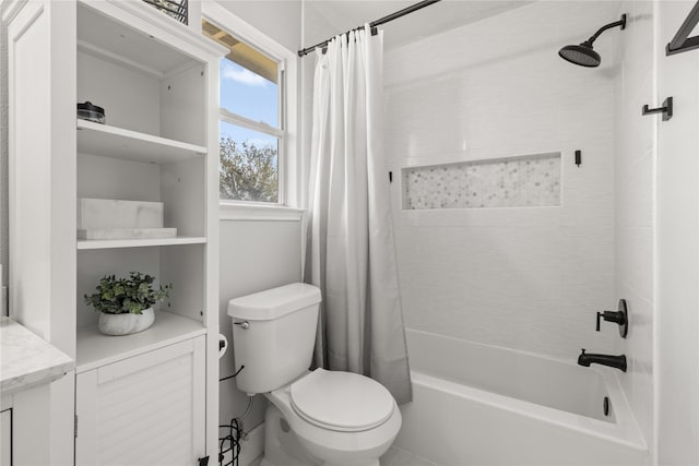 full bathroom with shower / bath combination with curtain, vanity, and toilet