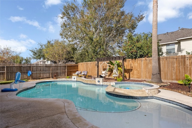 view of pool featuring an in ground hot tub