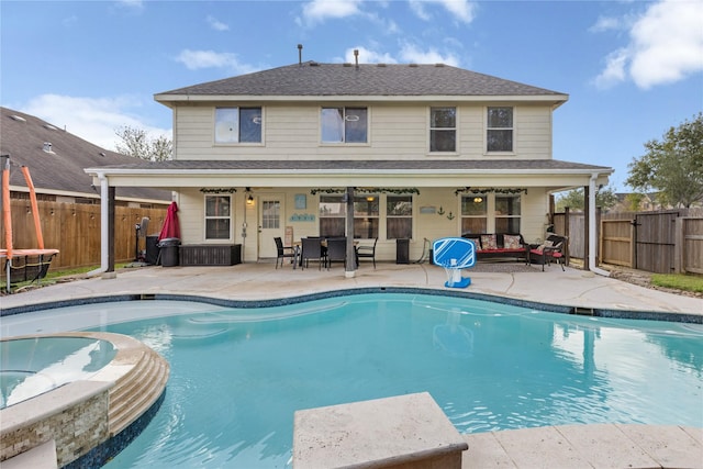 view of swimming pool with a patio area and outdoor lounge area