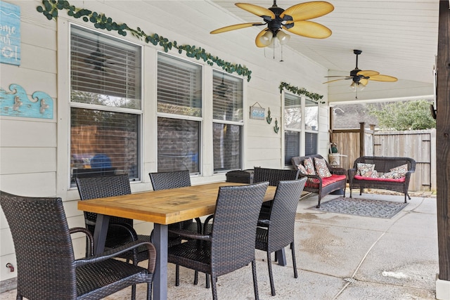 view of patio featuring an outdoor hangout area and ceiling fan