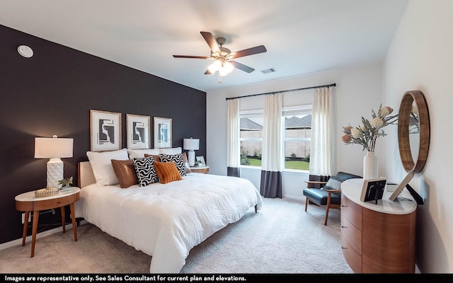 carpeted bedroom with ceiling fan