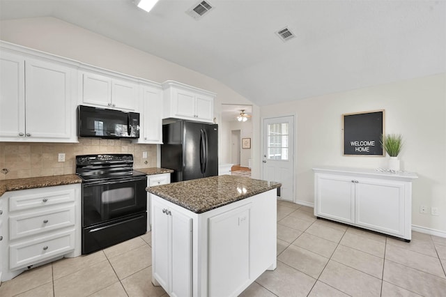 kitchen with ceiling fan, tasteful backsplash, lofted ceiling, a kitchen island, and black appliances