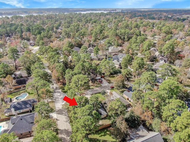 aerial view featuring a residential view and a forest view