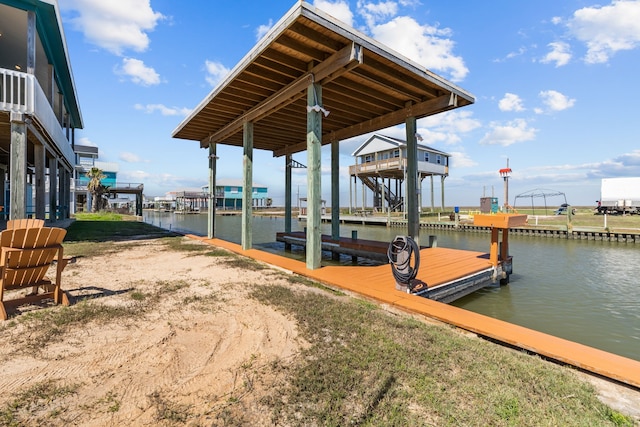 dock area featuring a water view