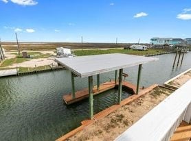 dock area featuring a water view