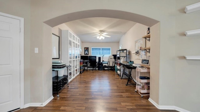 home office featuring ceiling fan and dark hardwood / wood-style floors