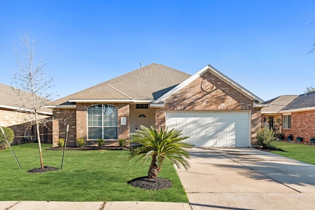 view of front facade featuring a front yard and a garage