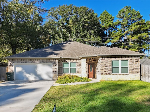 ranch-style home with a front yard and a garage