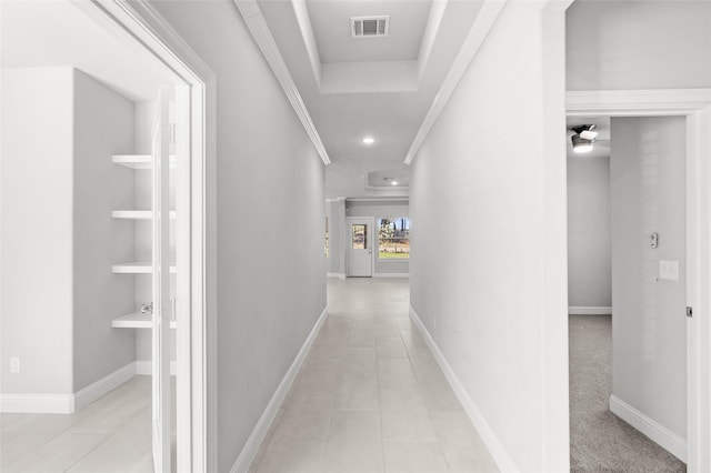 corridor with light carpet and ornamental molding