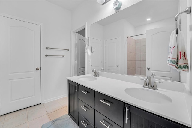 bathroom featuring tile patterned floors and vanity