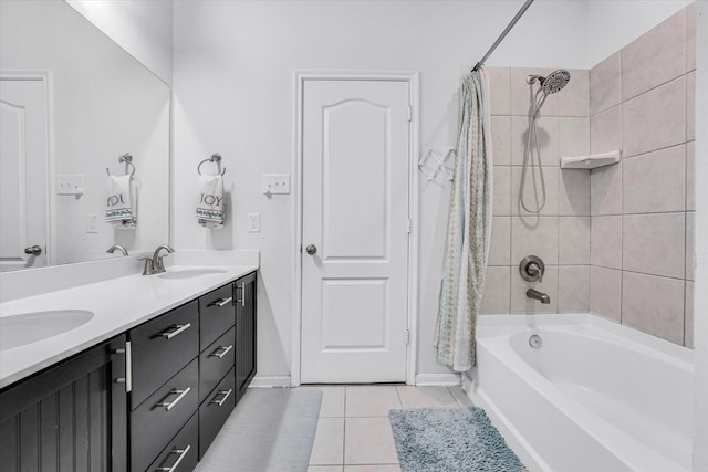 bathroom featuring shower / bath combination with curtain, vanity, and tile patterned floors