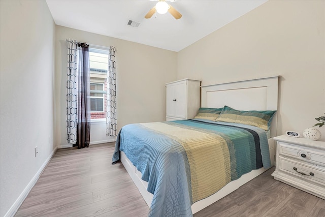 bedroom featuring wood-type flooring and ceiling fan