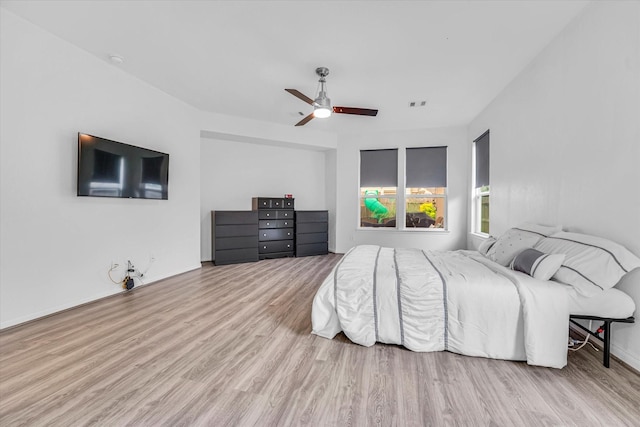 bedroom featuring ceiling fan and light wood-type flooring