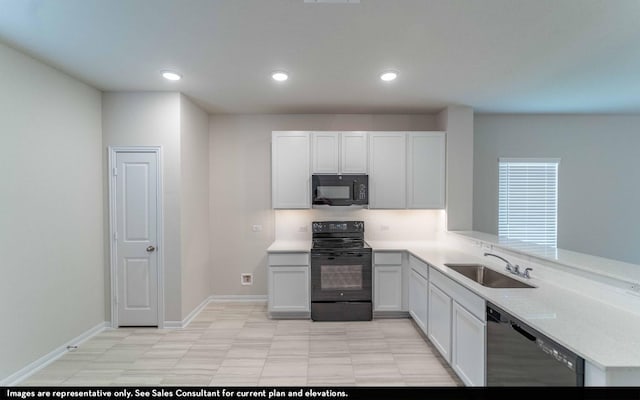 kitchen with kitchen peninsula, sink, white cabinets, and black appliances