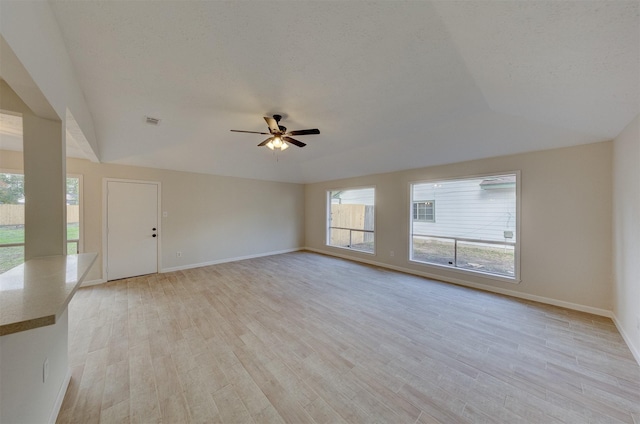 unfurnished living room with light hardwood / wood-style floors and ceiling fan