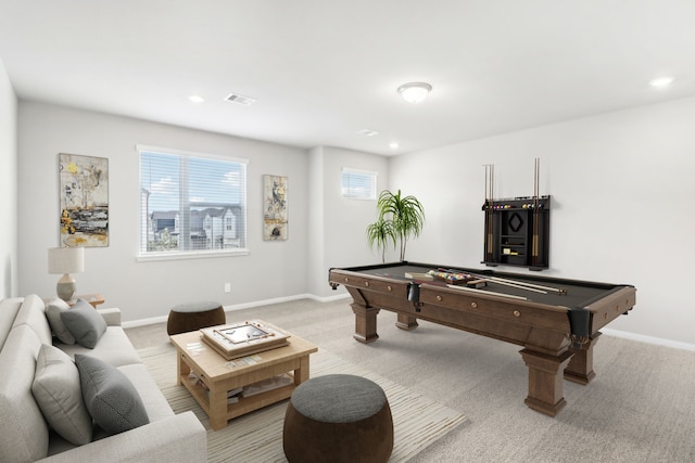 rec room with light colored carpet and pool table