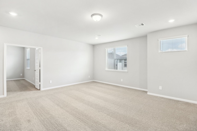 view of carpeted spare room