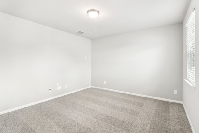 spare room with carpet flooring