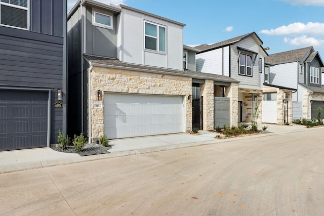 townhome / multi-family property featuring a garage